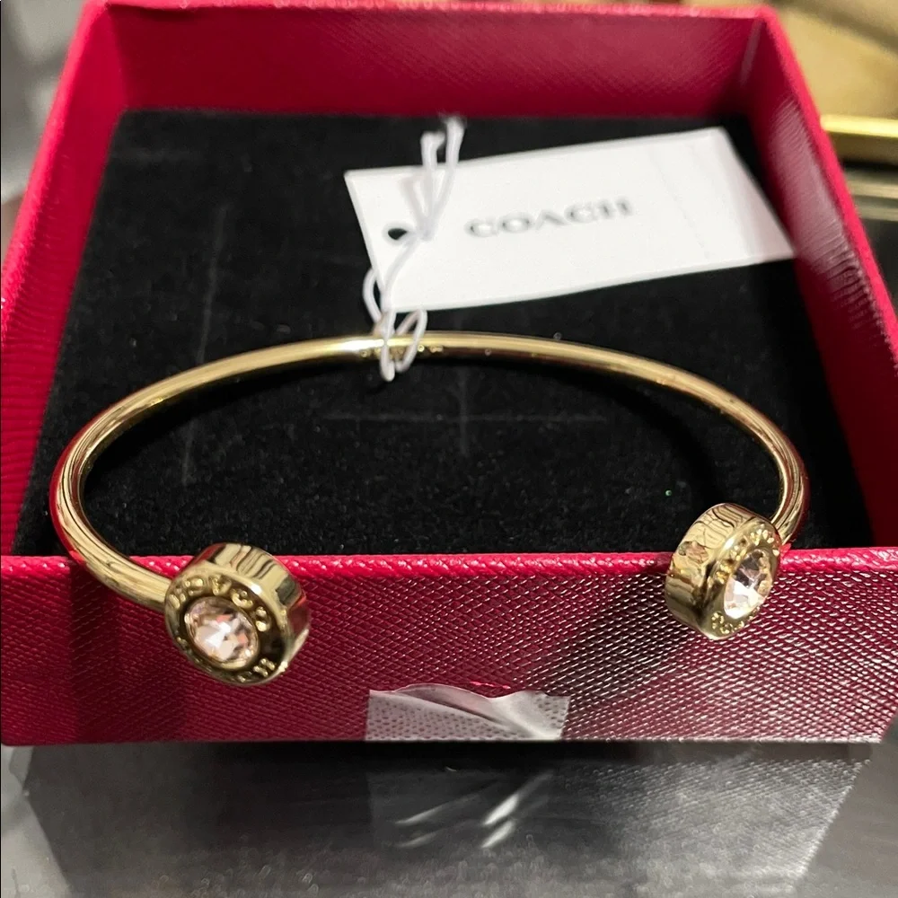 Coach Gold-Tone Open Cuff Bracelet with Crystal Ends